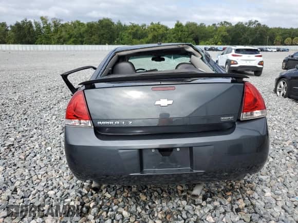 2013 Chevrolet Impala LTZ z VIN 2G1WC5E3XD1175652, wystawiony jako Copart lot #84699035 z przebiegiem 134 389 mil mil oraz Szkoda całkowita • Salvage title. Historia ofert i sprzedaży dostępna na DreamBid. Obrazek 6.