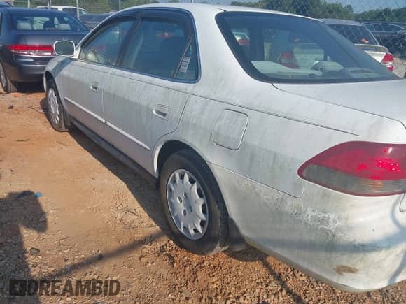 2001 Honda Accord LX with VIN 1HGCG56411A007343, listed as a IAAI auction lot 42659586 with 343,593 mi miles and . Bid and sale history available at DreamBid. Image 12.
