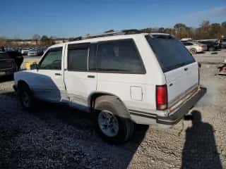 1993 Chevrolet Blazer с VIN 1GNCS13W2P2176146, выставлен на аукционе Copart как лот 83377744 с пробегом 135 816 миль миль и На запчасти • Non repairable. История ставок и продаж доступна на DreamBid. Изображение 2.