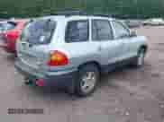 2003 Hyundai Santa Fe GLS with VIN KM8SC13D53U445931, listed as a IAAI auction lot 42453079 with 216,089 mi miles and . Bid and sale history available at DreamBid. Image 4.