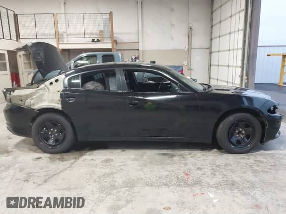 2018 Dodge Charger Police с VIN 2C3CDXAT5JH163232, выставлен на аукционе IAAI как лот 40096479 с пробегом 84 450 миль миль и . История ставок и продаж доступна на DreamBid. Изображение 14.