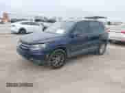 2014 Volkswagen Tiguan S с VIN WVGAV3AX0EW561155, выставлен на аукционе IAAI как лот 41362832 с пробегом 65 399 миль миль и . История ставок и продаж доступна на DreamBid. Изображение 2.