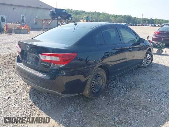 2019 Subaru Impreza with VIN 4S3GKAB60K3613799, listed as a IAAI auction lot 42868309 with 62,834 mi miles and . Bid and sale history available at DreamBid. Image 4.