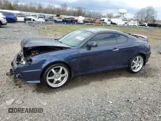 2004 Hyundai Tiburon GT с VIN KMHHN65F14U109145, выставлен на аукционе Copart как лот 51117385 с пробегом Не указан миль и Списание • Salvage title. История ставок и продаж доступна на DreamBid. Изображение 1.
