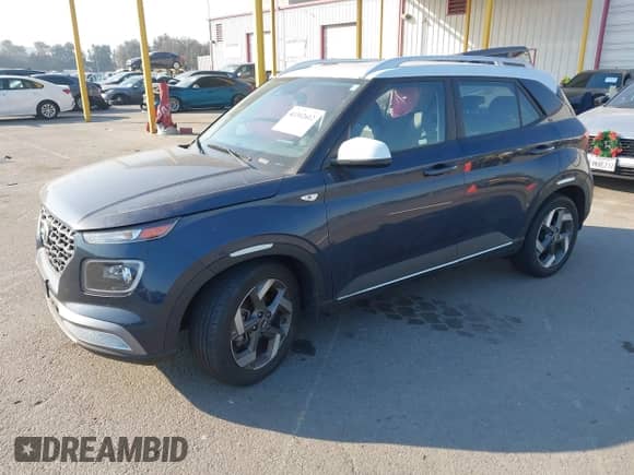 2021 Hyundai Venue SEL z VIN KMHRC8A3XMU126284, wystawiony jako IAAI lot #41302612 z przebiegiem 26 804 mil mil oraz . Historia ofert i sprzedaży dostępna na DreamBid. Obrazek 2.