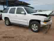 2003 Chevrolet Tahoe LS with VIN 1GNEC13Z63R109194, listed as a Copart auction lot 70428045 with 228,461 mi miles and Salvage title. Bid and sale history available at DreamBid. Image 4.