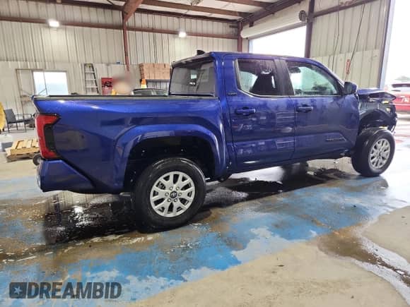 2025 Toyota Tacoma SR5 with VIN 3TMKB5FN4SM042285, listed as a Copart auction lot 70826095 with 252 mi miles and Salvage title. Bid and sale history available at DreamBid. Image 3.