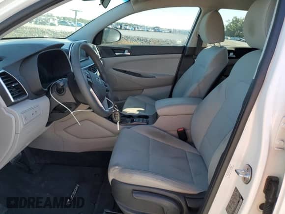 2019 Hyundai Tucson SE with VIN KM8J23A4XKU929654, listed as a Copart auction lot 86702375 with 91,200 mi miles and Salvage title. Bid and sale history available at DreamBid. Image 7.