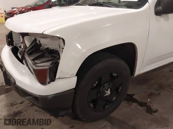 2012 Chevrolet Colorado Work Truck с VIN 1GCCSBF94C8162227, выставлен на аукционе IAAI как лот 42288088 с пробегом 101 162 миль миль и . История ставок и продаж доступна на DreamBid. Изображение 18.