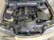 2006 BMW 3 Series 325Ci with VIN WBABW33456PX84390, listed as a Copart auction lot 80536395 with 179,140 mi miles and Salvage title. Bid and sale history available at DreamBid. Image 11.