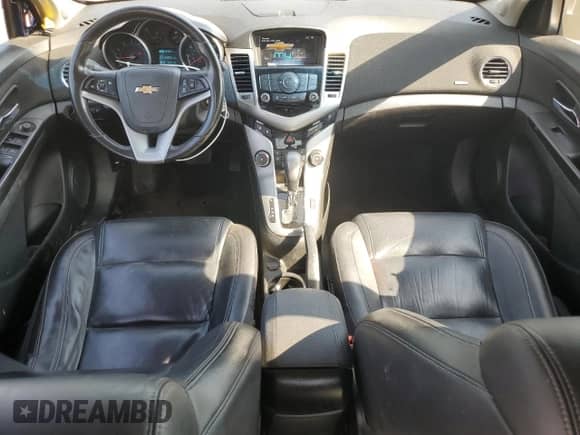 2013 Chevrolet Cruze 2LT z VIN 1G1PE5SB7D7244097, wystawiony jako Copart lot #80491875 z przebiegiem 128 936 mil mil oraz Szkoda całkowita • Salvage title. Historia ofert i sprzedaży dostępna na DreamBid. Obrazek 8.