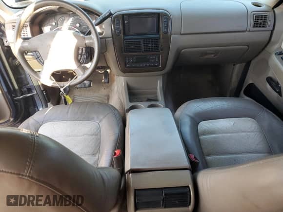 2004 Ford Explorer Eddie Bauer with VIN 1FMZU74W44UB78040, listed as a Copart auction lot 84029215 with 197,729 mi miles and Salvage title. Bid and sale history available at DreamBid. Image 8.