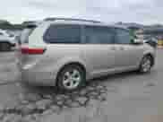 2015 Toyota Sienna LE with VIN 5TDKK3DC1FS629121, listed as a Copart auction lot 82244595 with 80,306 mi miles and Salvage title. Bid and sale history available at DreamBid. Image 3.