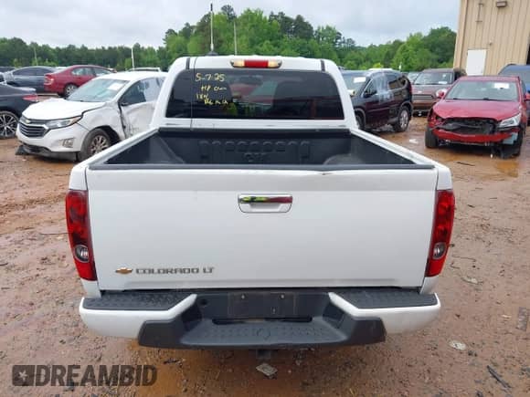 2011 Chevrolet Colorado 1LT z VIN 1GCHTCFE2B8127044, wystawiony jako IAAI lot #42245471 z przebiegiem 224 115 mil mil oraz . Historia ofert i sprzedaży dostępna na DreamBid. Obrazek 16.