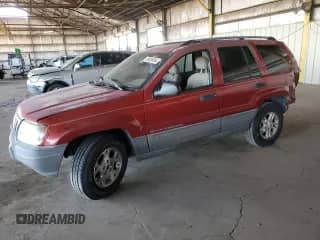 2002 Jeep Grand Cherokee with VIN 1J4GX38S52C166298, listed as a Copart auction lot 80655884 with 212,113 mi miles and Salvage title. Bid and sale history available at DreamBid. Image 1.