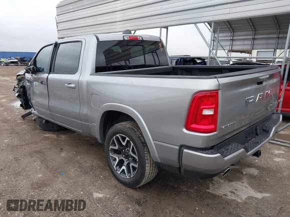 2025 Ram 1500 with VIN 1C6RREJP5SN601648, listed as a IAAI auction lot 41022685 with 2,383 mi miles and . Bid and sale history available at DreamBid. Image 3.