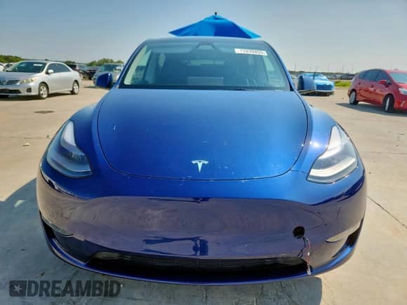 2024 Tesla Model Y Long Range with VIN 7SAYGDEE2RA279895, listed as a Copart auction lot 72039455 with 18,522 mi miles and Salvage title. Bid and sale history available at DreamBid. Image 5.