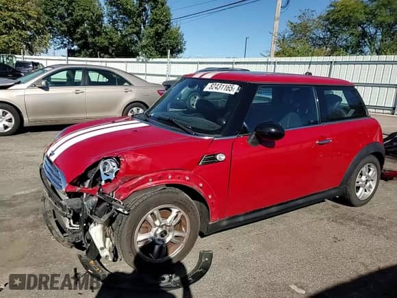 2013 MINI Hardtop with VIN WMWSU3C52DT370051, listed as a Copart auction lot 82431165 with 68,570 mi miles and Salvage title. Bid and sale history available at DreamBid. Image 13.