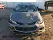 2018 Chevrolet Cruze LT z VIN 3G1BH6SE3JS636492, wystawiony jako Copart lot #80988884 z przebiegiem Nie podano mil oraz Szkoda całkowita • Salvage title. Historia ofert i sprzedaży dostępna na DreamBid. Obrazek 5.