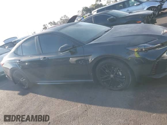 2025 Toyota Camry SE with VIN 4T1DAACK3SU592440, listed as a IAAI auction lot 43243159 with 7,671 mi miles and . Bid and sale history available at DreamBid. Image 13.