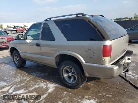 2002 Chevrolet Blazer LS с VIN 1GNCS18W52K214535, выставлен на аукционе Copart как лот 55815465 с пробегом 160 614 миль миль и Списание • Salvage title. История ставок и продаж доступна на DreamBid. Изображение 2.