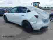 2023 Tesla Model Y Long Range с VIN 7SAYGDEE2PA032311, выставлен на аукционе IAAI как лот 42720695 с пробегом 20 640 миль миль и . История ставок и продаж доступна на DreamBid. Изображение 3.