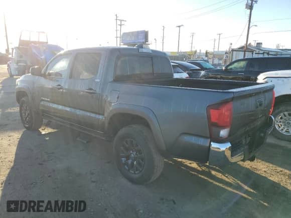 2023 Toyota Tacoma SR5 z VIN 3TMAZ5CN9PM214829, wystawiony jako Copart lot #87104895 z przebiegiem 10 509 mil mil oraz Szkoda całkowita • Salvage title. Historia ofert i sprzedaży dostępna na DreamBid. Obrazek 2.
