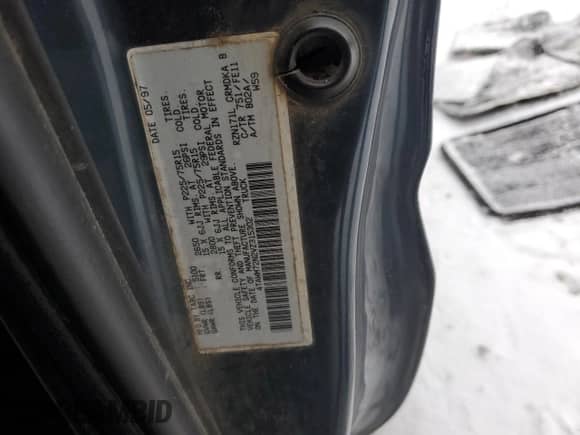 1997 Toyota Tacoma z VIN 4TAWM72N2VZ315302, wystawiony jako Copart lot #87952085 z przebiegiem 190 437 mil mil oraz Szkoda całkowita • Salvage title. Historia ofert i sprzedaży dostępna na DreamBid. Obrazek 14.