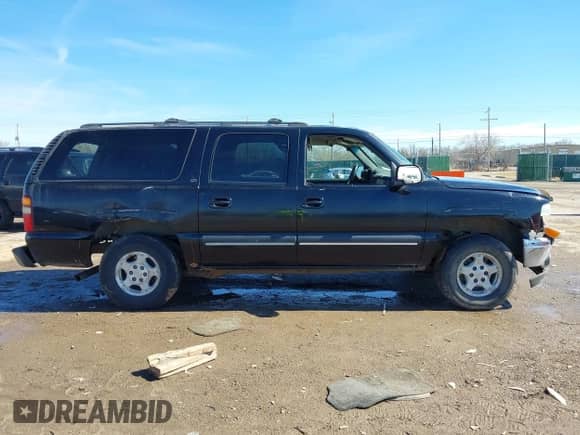 2002 Chevrolet Suburban Z71 with VIN 3GNFK16Z32G202949, listed as a IAAI auction lot 41637140 with 277,161 mi miles and . Bid and sale history available at DreamBid. Image 14.