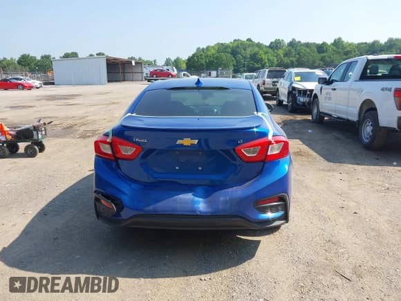 2018 Chevrolet Cruze LT with VIN 1G1BE5SM4J7193259, listed as a IAAI auction lot 42411924 with 103,816 mi miles and . Bid and sale history available at DreamBid. Image 16.