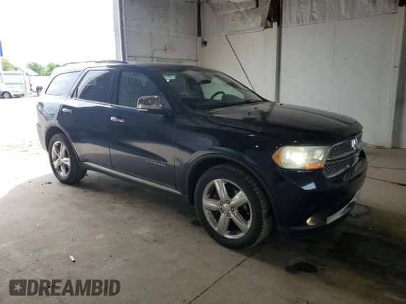 2012 Dodge Durango Citadel with VIN 1C4RDJEG0CC188299, listed as a Copart auction lot 56748885 with 169,028 mi miles and Clean title. Bid and sale history available at DreamBid. Image 4.