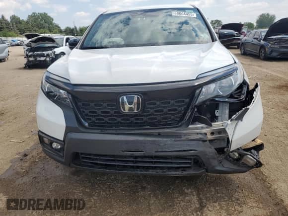 2021 Honda Passport Sport z VIN 5FNYF8H28MB001863, wystawiony jako Copart lot #68664455 z przebiegiem 71 523 mil mil oraz Szkoda całkowita • Salvage title. Historia ofert i sprzedaży dostępna na DreamBid. Obrazek 5.