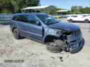 2021 Jeep Grand Cherokee High Altitude with VIN 1C4RJECG8MC737932, listed as a Copart auction lot 58368885 with 61,863 mi miles and Salvage title. Bid and sale history available at DreamBid. Image 4.