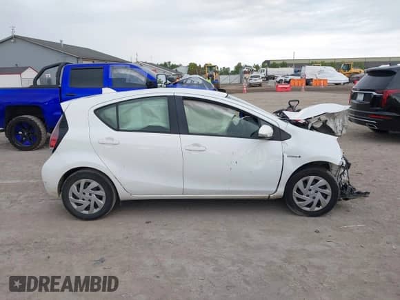 2015 Toyota Prius One z VIN JTDKDTB38F1576685, wystawiony jako IAAI lot #43028634 z przebiegiem 153 700 mil mil oraz . Historia ofert i sprzedaży dostępna na DreamBid. Obrazek 14.