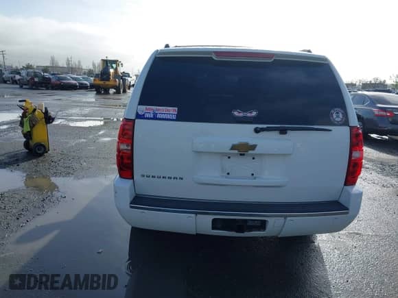 2014 Chevrolet Suburban LTZ with VIN 1GNSKKE79ER139252, listed as a IAAI auction lot 41197789 with 170,065 mi miles and . Bid and sale history available at DreamBid. Image 17.