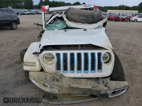 2021 Jeep Wrangler Unlimited Sahara with VIN 1C4JJXP64MW682744, listed as a Copart auction lot 69235075 with 65,533 mi miles and Salvage title. Bid and sale history available at DreamBid. Image 5.