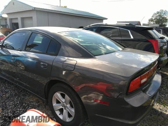 2014 Dodge Charger SE с VIN 2C3CDXBG7EH192593, выставлен на аукционе IAAI как лот 43595432 с пробегом 172 188 миль миль и . История ставок и продаж доступна на DreamBid. Изображение 3.