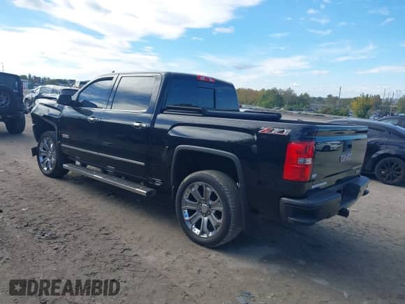 2015 GMC Sierra 1500 SLT z VIN 3GTU2VEC2FG141443, wystawiony jako IAAI lot #43458098 z przebiegiem 141 543 mil mil oraz . Historia ofert i sprzedaży dostępna na DreamBid. Obrazek 3.
