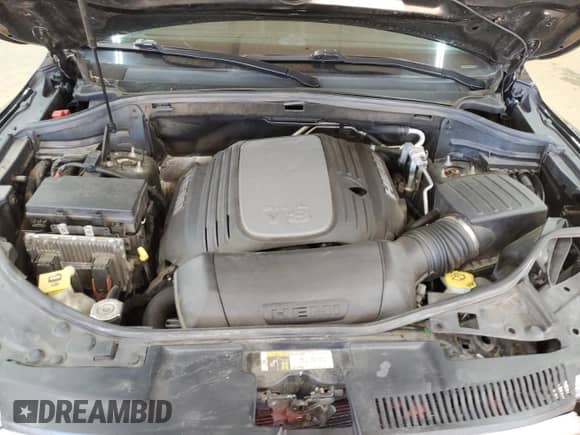 2018 Dodge Durango Citadel Anodized Platinum with VIN 1C4SDJET7JC302357, listed as a Copart auction lot 82209205 with 104,428 mi miles and Salvage title. Bid and sale history available at DreamBid. Image 12.