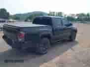 2022 Toyota Tacoma Limited with VIN 3TMGZ5AN6NM503824, listed as a IAAI auction lot 42416566 with 48,561 mi miles and . Bid and sale history available at DreamBid. Image 4.