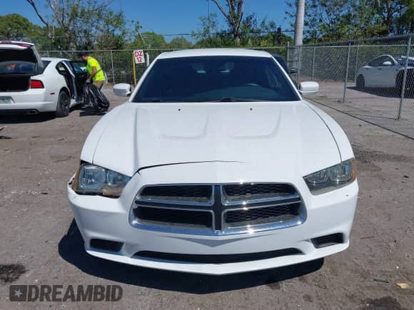 2014 Dodge Charger SE with VIN 2C3CDXBG9EH315018, listed as a IAAI auction lot 41754604 with 103,676 mi miles and . Bid and sale history available at DreamBid. Image 12.