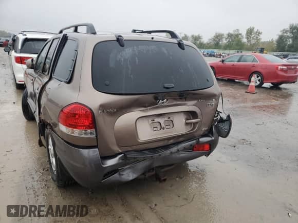 2005 Hyundai Santa Fe GLS z VIN KM8SC73EX5U001216, wystawiony jako Copart lot #72630284 z przebiegiem Nie podano mil oraz Szkoda całkowita • Salvage title. Historia ofert i sprzedaży dostępna na DreamBid. Obrazek 6.