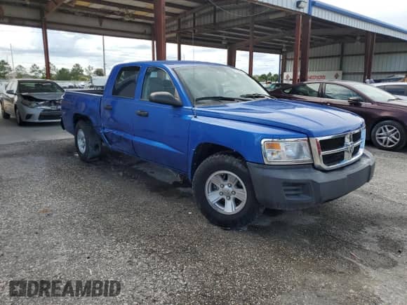 2008 Dodge Dakota с VIN 1D3HW38K18S526797, выставлен на аукционе Copart как лот 71172075 с пробегом 126 696 миль миль и Списание • Salvage title. История ставок и продаж доступна на DreamBid. Изображение 4.