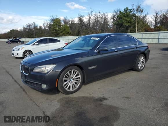 2011 BMW 7 Series 740Li with VIN WBAKB4C52BC392785, listed as a Copart auction lot 86619215 with 211,977 mi miles and Clean title. Bid and sale history available at DreamBid. Image 1.