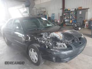 1998 Toyota Camry LE z VIN 4T1BF22K7WU074370, wystawiony jako IAAI lot #42686857 z przebiegiem Nie podano mil oraz . Historia ofert i sprzedaży dostępna na DreamBid. Obrazek 1.