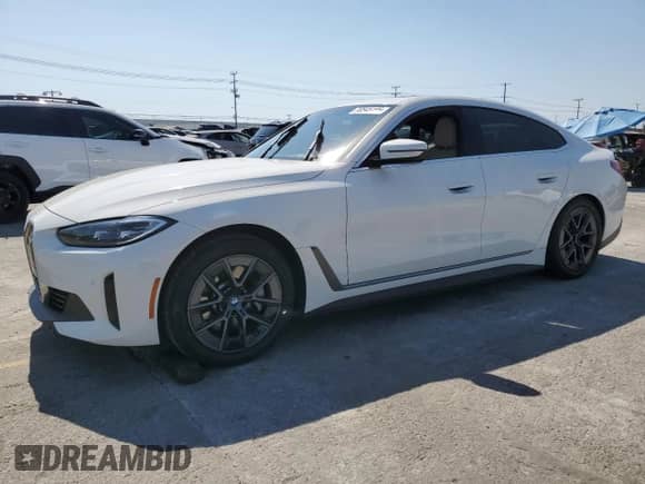 2024 BMW i4 eDrive35 with VIN WBY43AW04RFR59223, listed as a Copart auction lot 70545195 with 30,051 mi miles and Salvage title. Bid and sale history available at DreamBid. Image 1.