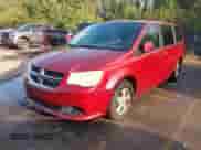 2011 Dodge Grand Caravan Mainstreet with VIN 2D4RN3DG4BR601733, listed as a IAAI auction lot 43148066 with 171,191 mi miles and . Bid and sale history available at DreamBid. Image 2.