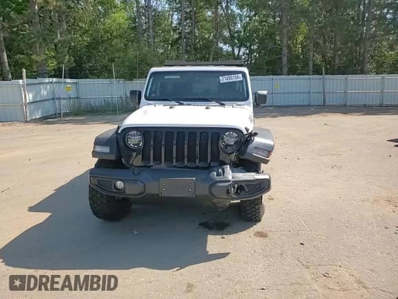 2022 Jeep Wrangler Unlimited Willys z VIN 1C4HJXDM0NW244953, wystawiony jako Copart lot #71495154 z przebiegiem 14 577 mil mil oraz Szkoda całkowita • Salvage title. Historia ofert i sprzedaży dostępna na DreamBid. Obrazek 11.