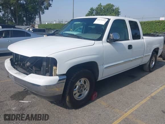 2000 GMC Sierra 1500 SLE z VIN 1GTEC19T0YZ300810, wystawiony jako IAAI lot #42471227 z przebiegiem Nie podano mil oraz . Historia ofert i sprzedaży dostępna na DreamBid. Obrazek 17.
