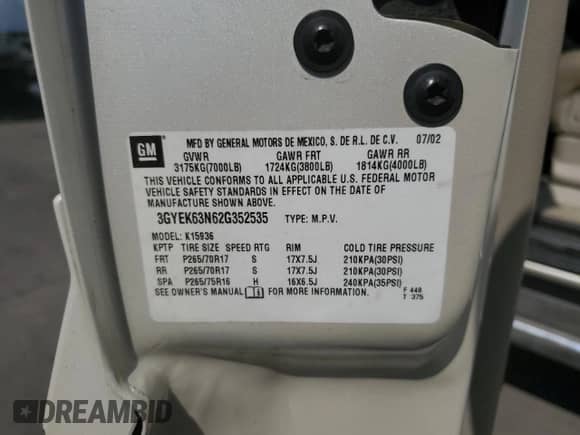 2002 Cadillac Escalade EXT with VIN 3GYEK63N62G352535, listed as a Copart auction lot 65949854 with 174,828 mi miles and Salvage title. Bid and sale history available at DreamBid. Image 13.